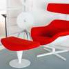Cassina Auckland draaifauteuil met poef - Vooraanzicht