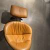LABEL vandenberg Hidde Soft draaifauteuil met poef - Zijaanzicht links