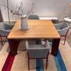 Cassina Ordinal eettafel - 140x140 - Zijaanzicht links