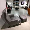 Natuzzi Clemmie fauteuil met hocker - Vooraanzicht