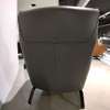 Natuzzi Clemmie fauteuil met hocker - Achter aanzicht