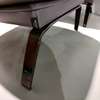 Natuzzi Clemmie fauteuil met hocker - Details