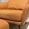 Rolf Benz Jon fauteuil met poef - Zijaanzicht links