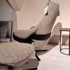 Leolux Cream fauteuil met poef - Showroom